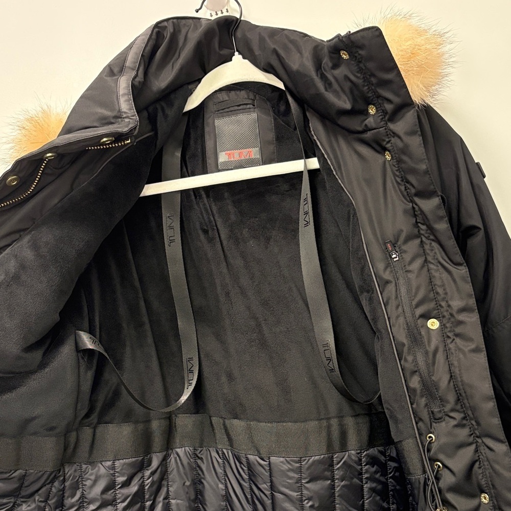 TUMI BLACK PUFFER COAT WITH TAN FUR TRIM. - Picture 3 of 16